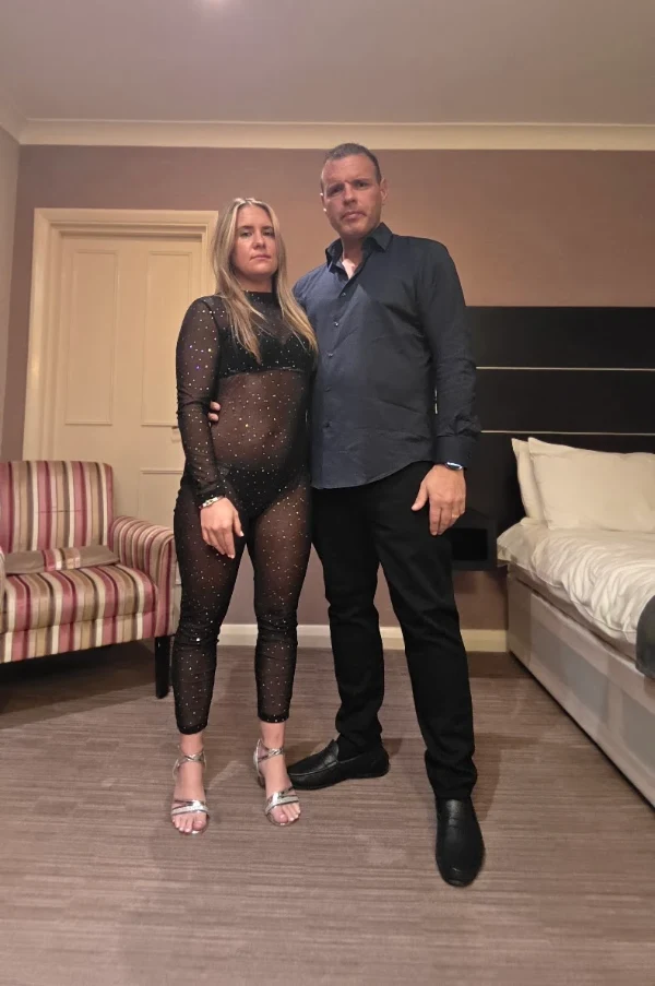 Sean and Sophie, the couple behind SwingDesire, dressed for a night out
